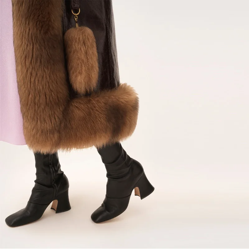 Moda mujer Otoño Invierno abrigo de piel sintética de alta calidad abrigo largo peludo suelto chaqueta cálida 2025 señora nueva prendas de vestir de calle alta