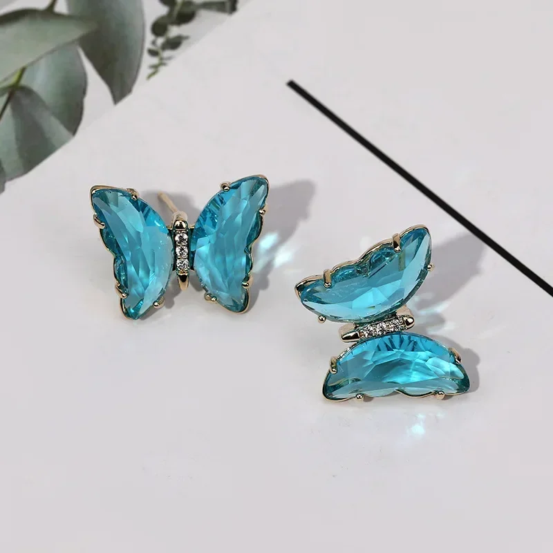 

2025 The new S925 transparent colored butterfly stud earrings are sweet, fresh and elegant stud earrings for ladies