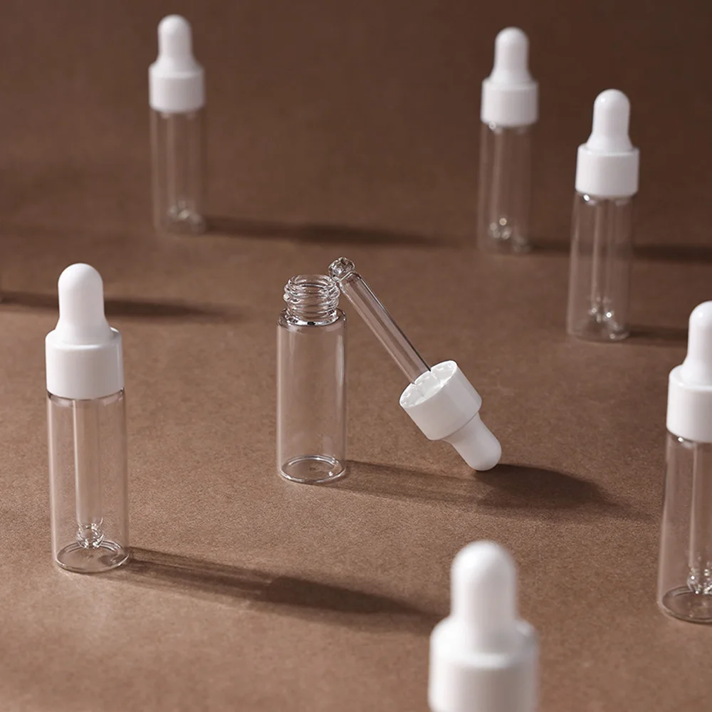 5/10 pezzi Bottiglie vuote per olio essenziale con contagocce in vetro sottile da 5 ml con set di coperchi bianchi con imbuti e contagocce ideali per olio essenziale