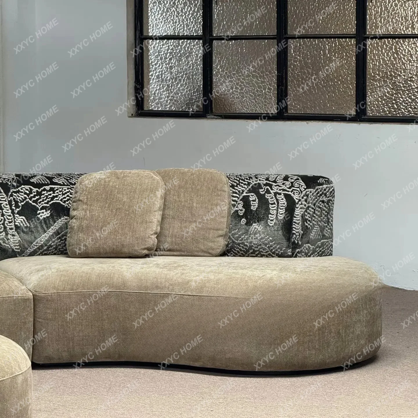 A  medieval old money wind curved fabric sofa large flat crescent special-shaped module sofa