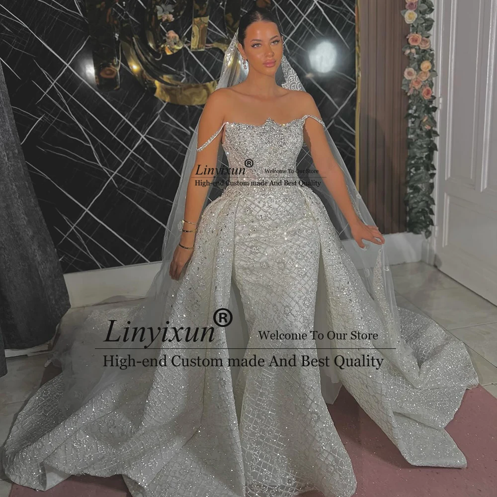 분리 가능한 기차가있는 럭셔리 스팽글 웨딩 드레스 민소매 인어 신부 가운 맞춤형 فساتين زفاف ٢٠٢٥ W