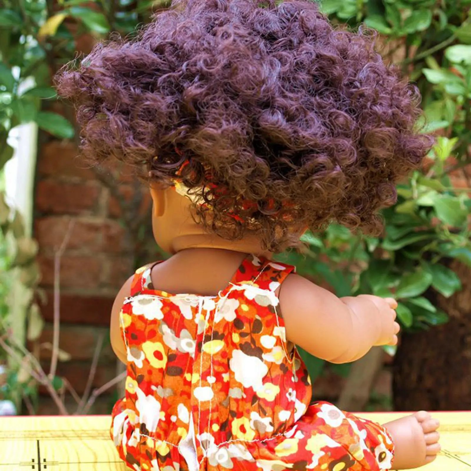 

Lifelike Baby Doll Can Speak with Outfits Play Washable African Baby Doll for