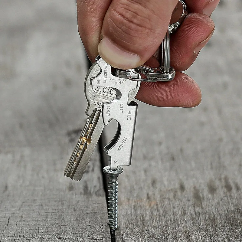 Multifunctional Bottle Opener Keychain Tool Hanger Tweezers Nail File Bottle Driver Screwdriver Stainless Steel Outdoor Camping view 2