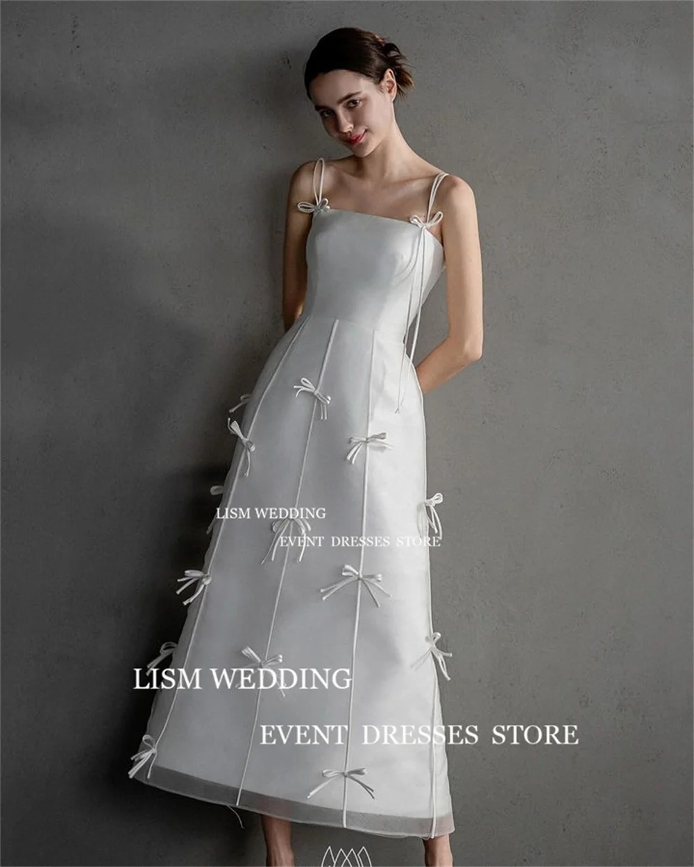 LISM Boat Neck Satin Wedding Dresses Spaghetti Straps Backless Bride Gowns 2025 Simple Bow Floor Custom Size Bridal Party Dress