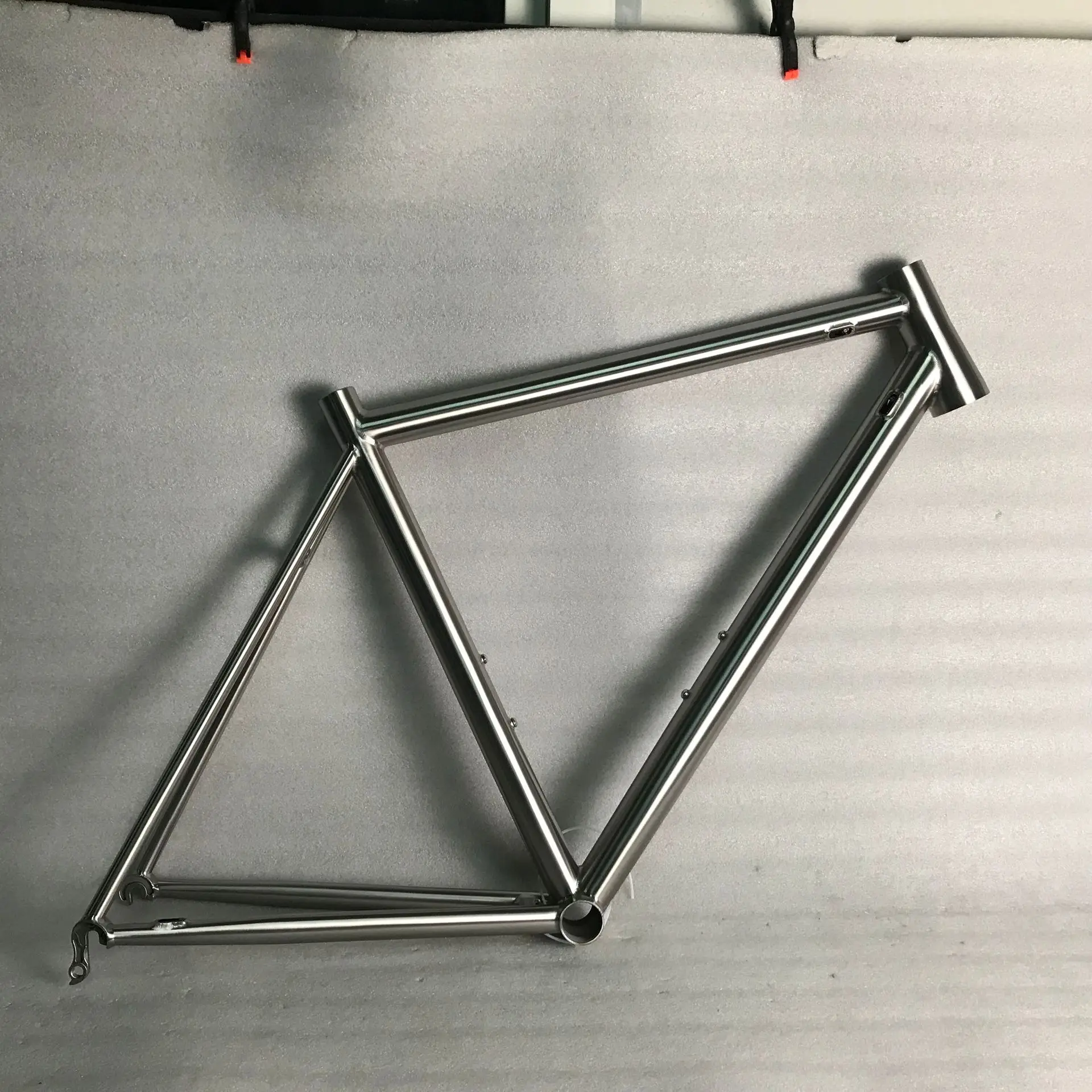 

Racing titanium road bike frame for internal routing