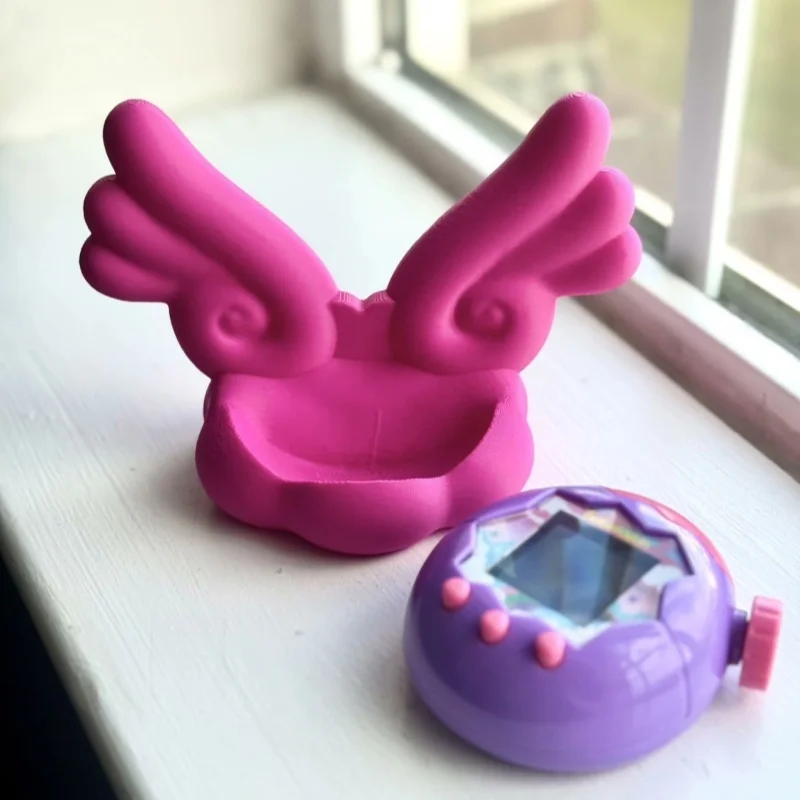 

New Tamagotch Paradise Base Universal Angel Wing Base Cuddly Cartoon Stand Fashion Trendy Ornament Dopamine Holiday Gift