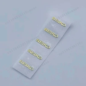 Logo Studs, Dial Labeling, Metal LOGO GS  Dial  Label Sticker
