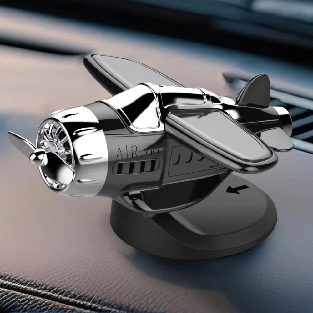 Solar Powered Rotating Propeller Fighter Car Ornament With Light Activated Movement And Energy Collection For Vehicle Use