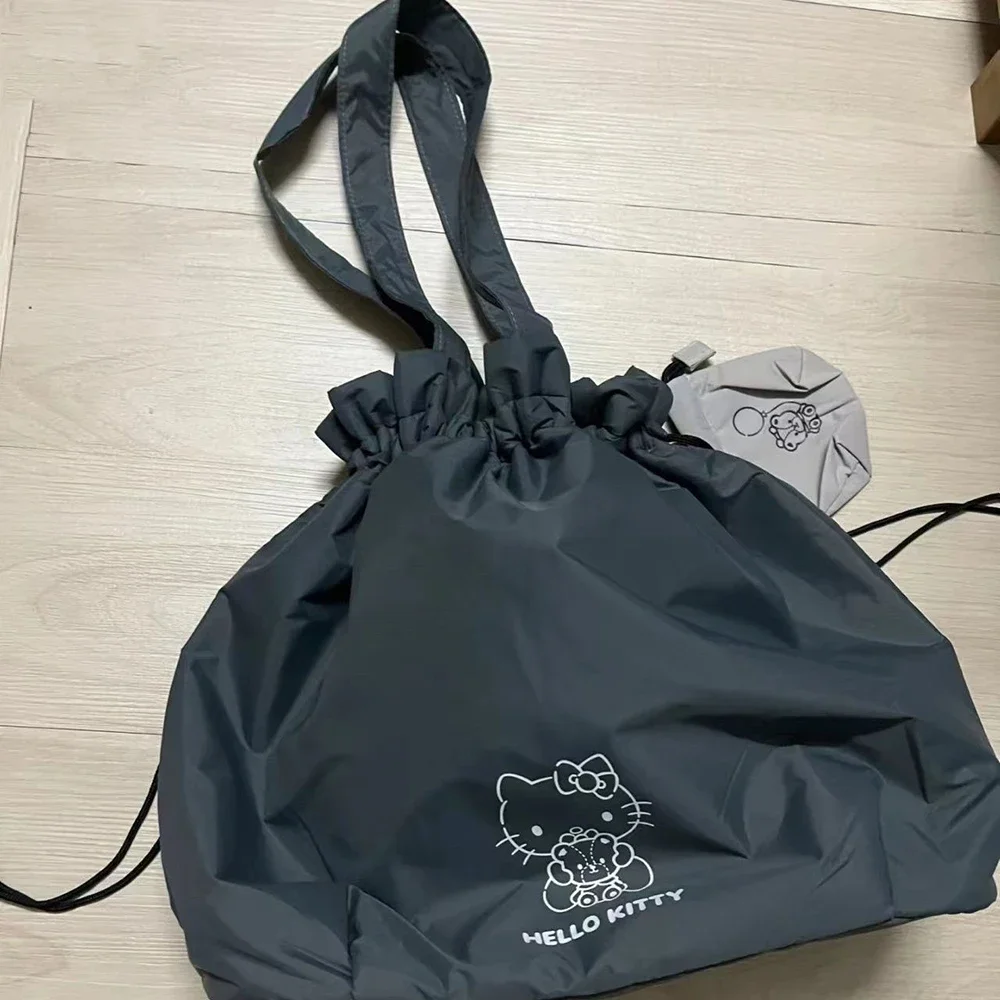 

Hello Kitty Shoulder Bag Cute Cartoon Portable Waterproof Pull Rope Cosmetic Bag Solid Color High-capacity Travel Tote Bag Gifts