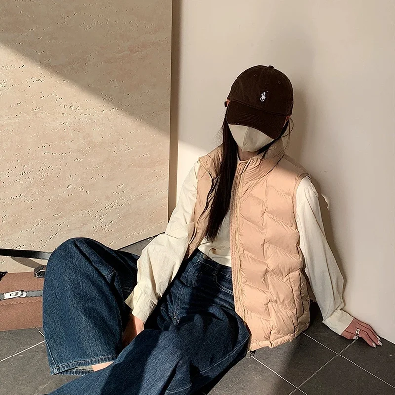 Women Fashion Autumn New 2025 Stand Collar Elegant Down Coats Warm Outerwear Casual Belt Sleeveless Winter Women Vests Jackets