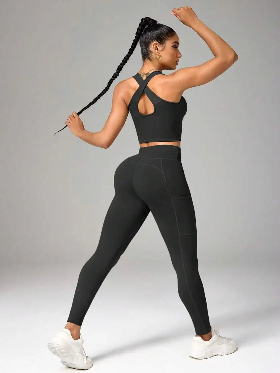 

Women Solid Crisscross Back Sports Bra And High Waisted Leggings Set