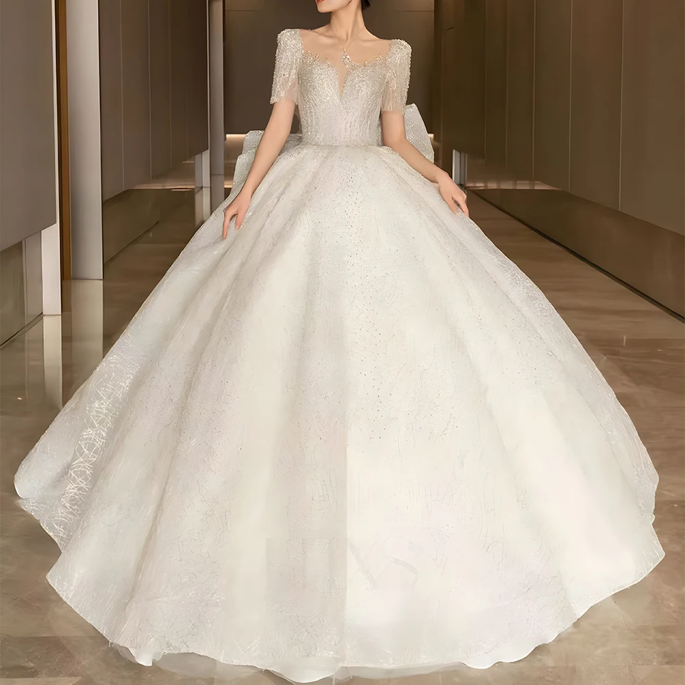 Jancember Exquisite Elegant Wedding Dresses O-Neck Illusion Short Sleeves Ball Gown Bow Backless Sequined Vestido Noiva LSHT007