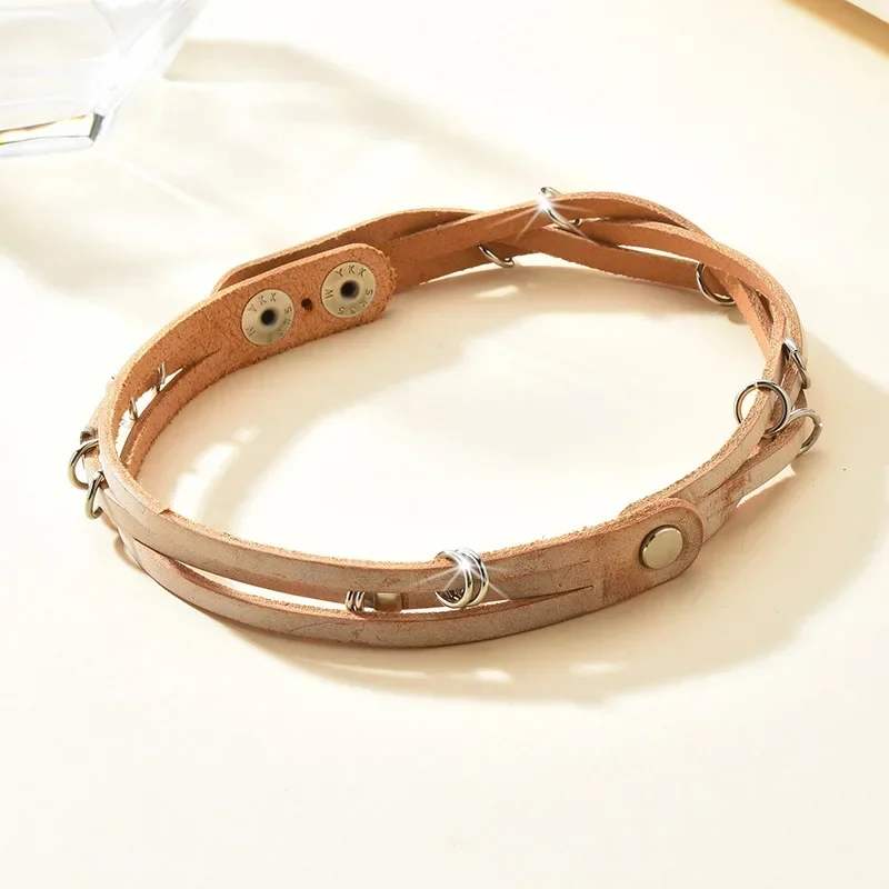 

A brand-new multi-faceted handcrafted women's cowhide collar. It can be worn as a wrist strap twice with a neck strap 01