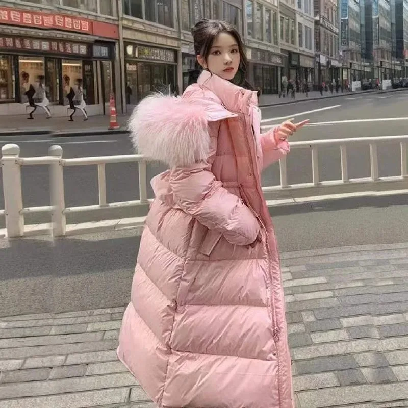 2026 سترة طويلة للنساء الشتاء مقنعين مع كبيرة الفراء طوق Cinched الخصر جديد الراقية معطف دافئ الوردي الملابس النسائية