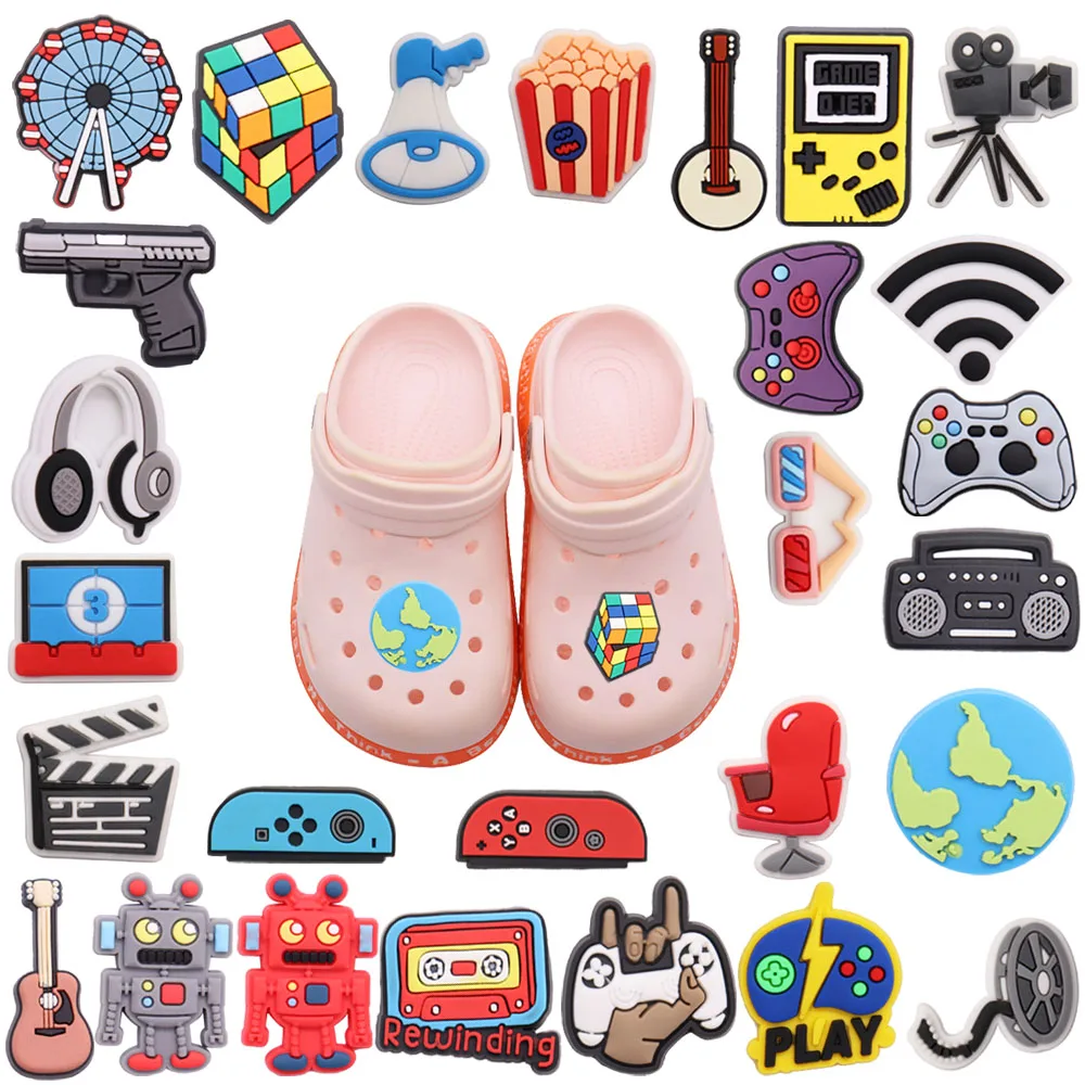 1 pz PVC Shoe Charms Console di gioco Popcorn Movie Speaker Gun Wifi ruota panoramica Earth Hole Slipper Decoration Bands bracciali