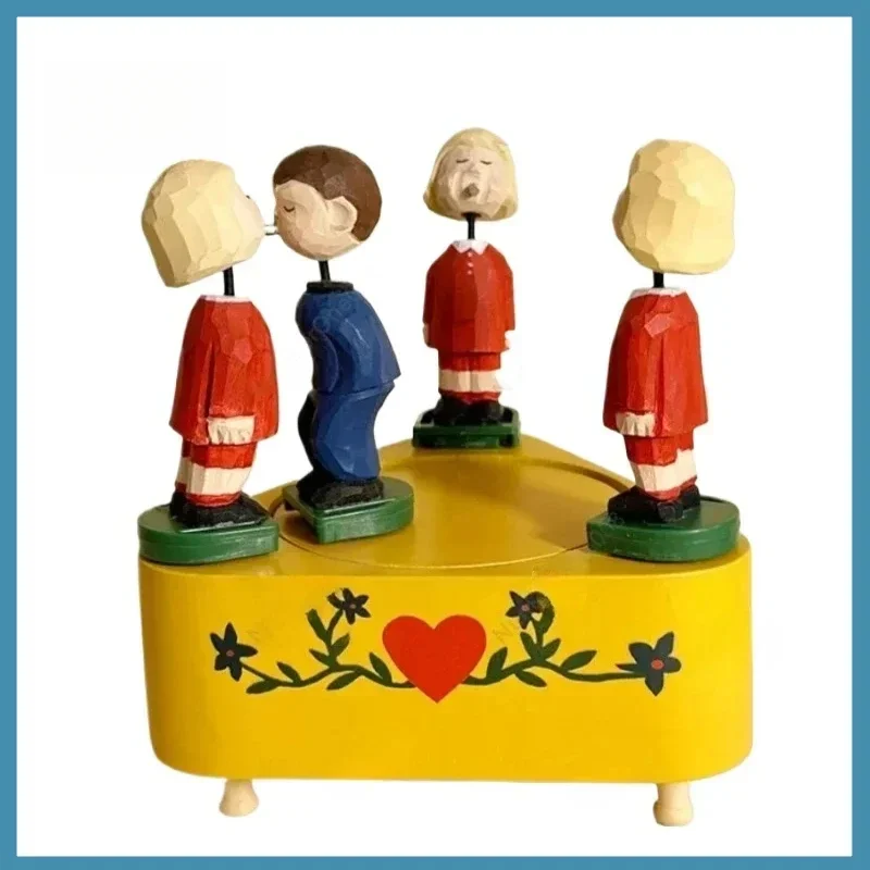 Hot sales Music Box Solid Wood Engraving Music Box Kiss Creative Birthday Gift Ornament Electric Rotating Speaker