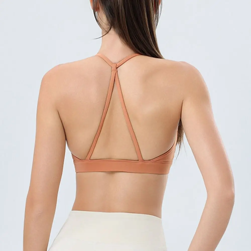 

Full Coverage Seamless Women's Sports Bra Durable with Chest Pad Fitness Gym Bra Reusable Hollow Out Fashion Yoga Tops Yoga