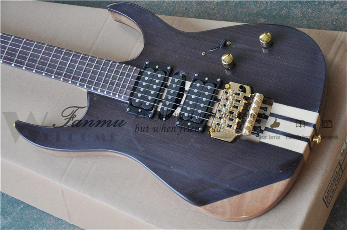 6-string electric guitar, techno veneer, maple through mahogany body, tremolo bridge, HSH pickups