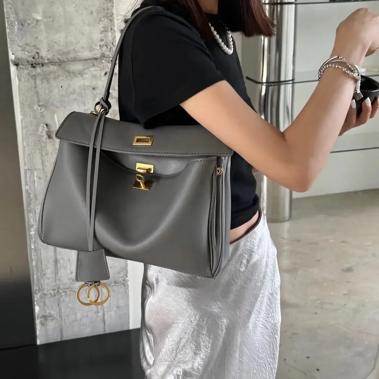 2025 New Leather Rodeobag Lock Buckle Underarm Single Shoulder Slant Cross Casual Commuting Kiley Women's Bag Unisex