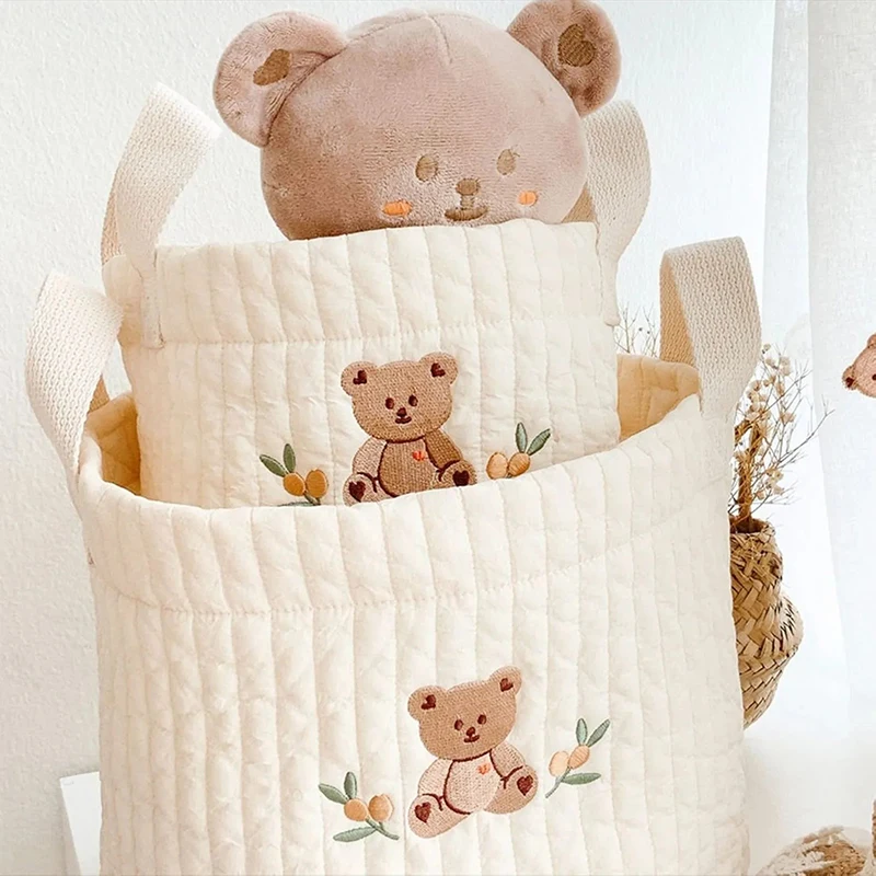 INS กระเป๋าเด็กหมีน่ารักเย็บปักถักร้อยกระเป๋าผ้าอ้อม Mummy Maternity กระเป๋าสําหรับผ้าอ้อมทารกแรกเกิดของเล่น Organizer