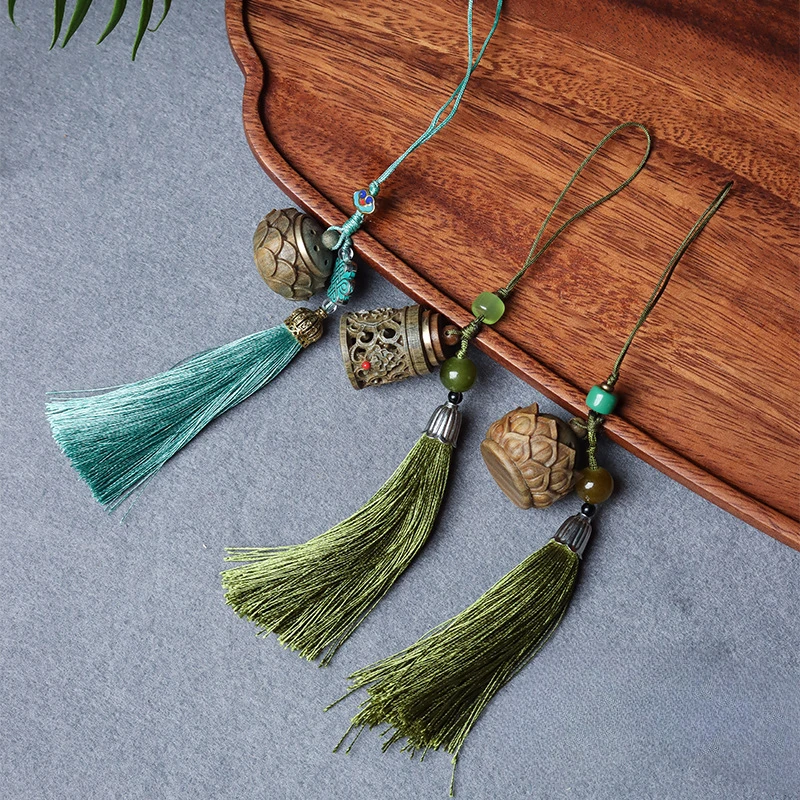 

Chinese style green sandalwood finely carved lotus sachet, hand-held tassel toy pendant