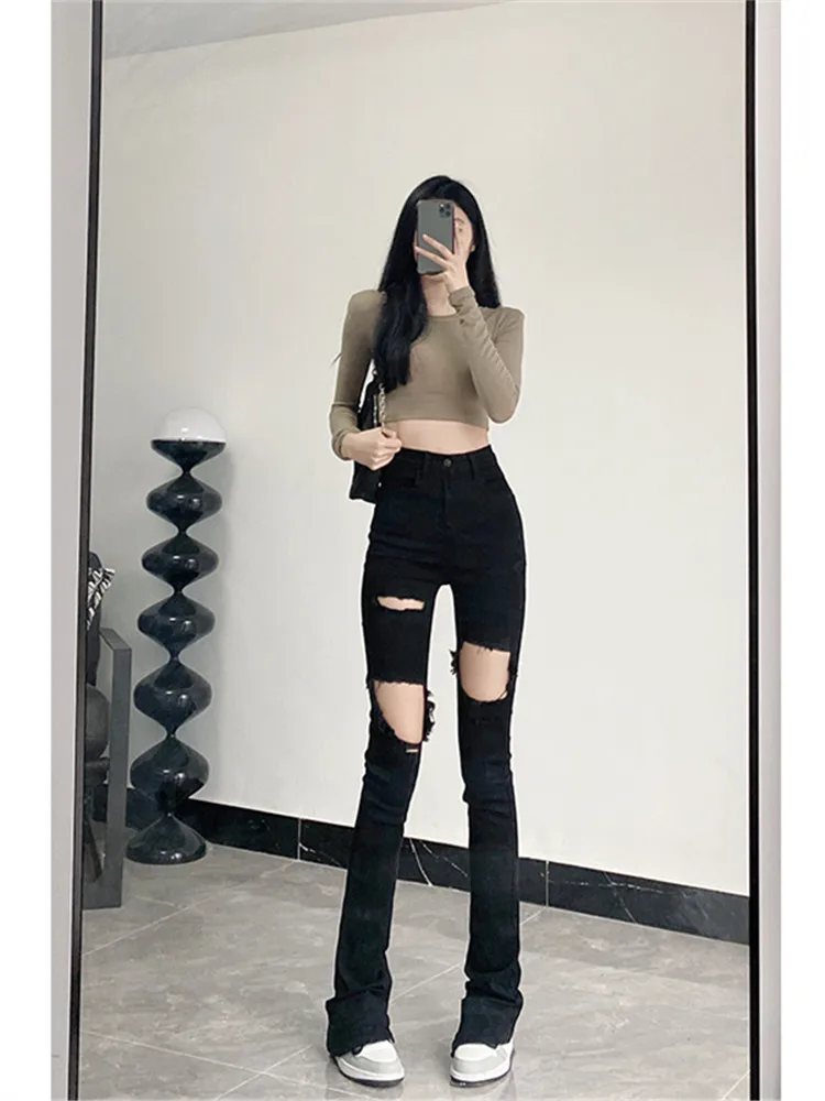 

Американские ретро-джинсы с высокой талией, расклешенные, женские, летние, тонкие, длинные, черные, с микро-расклешением и рваными элементами