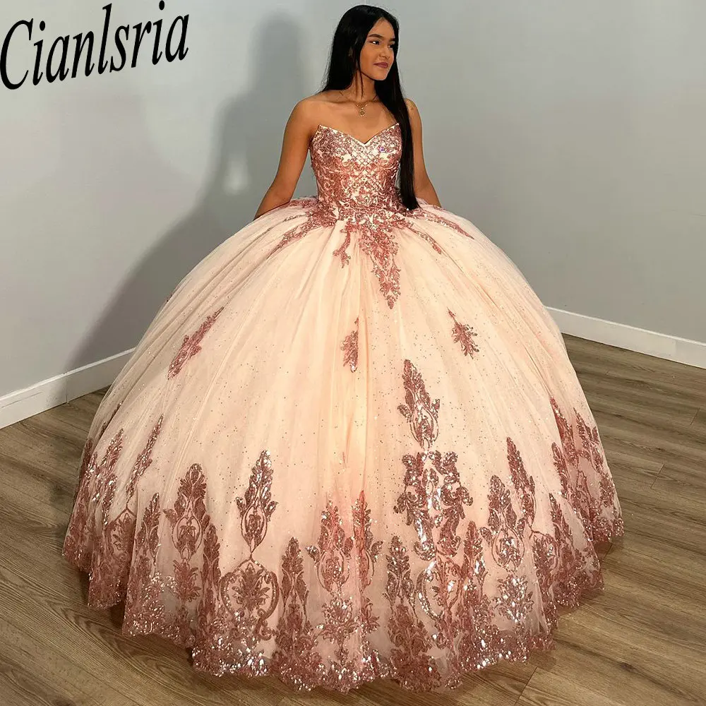 

Rose Gold Strapless Ball Gown Quinceanera Dresses Sequined Appliques Lace Corset Vestidos De 15 Años