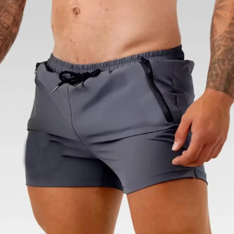 

Мужские пляжные новые спортивные шорты, мужские шорты для бега в тренажерном зале, шорты для бега, бодибилдинга, летние шорты для фитнеса и бега