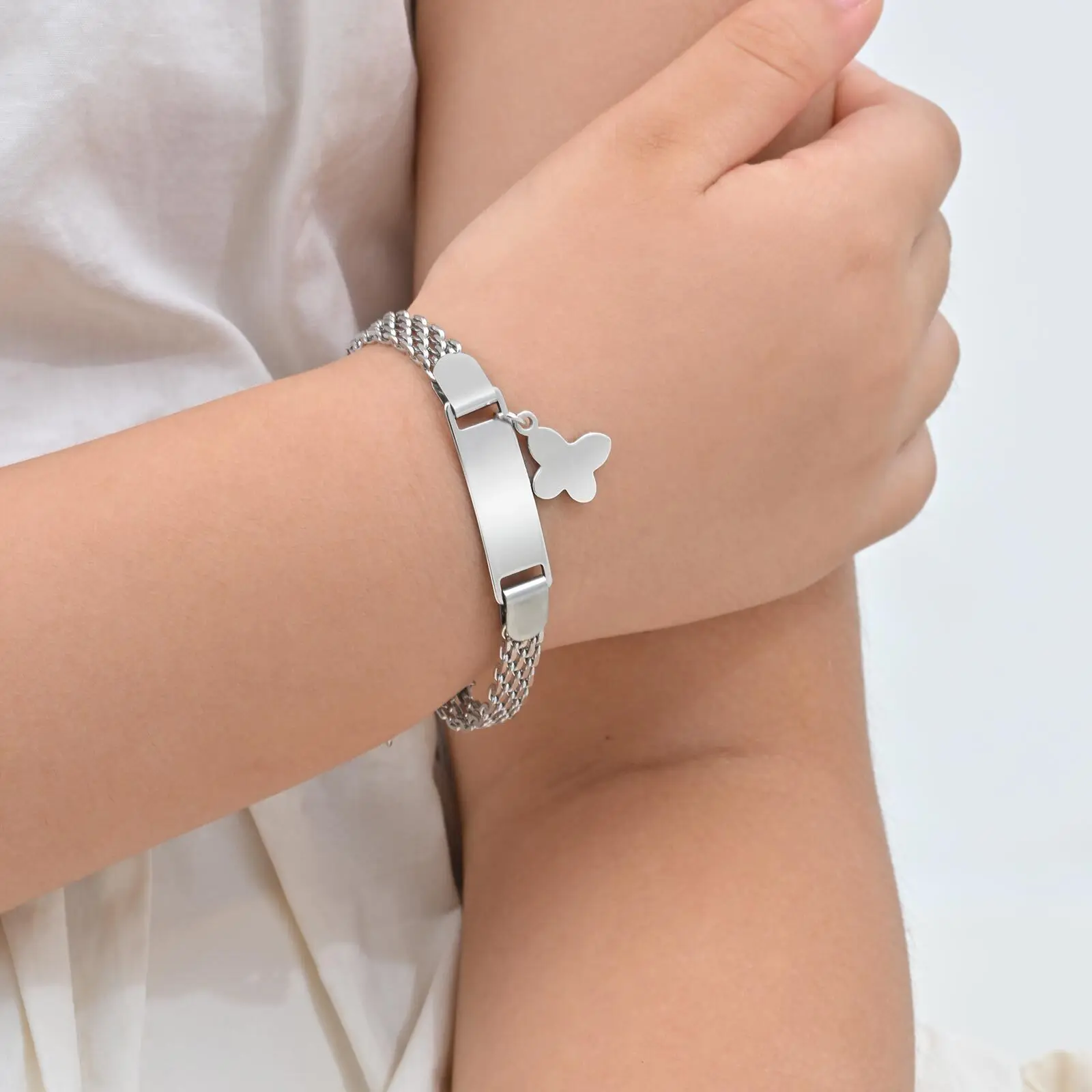 Vnox ฟรีที่กําหนดเองสร้อยข้อมือเด็กสําหรับชายและหญิง, สแตนเลสข้อความป้ายโบว์จี้สายคล้องสร้อยข้อมือเครื่องประดับ