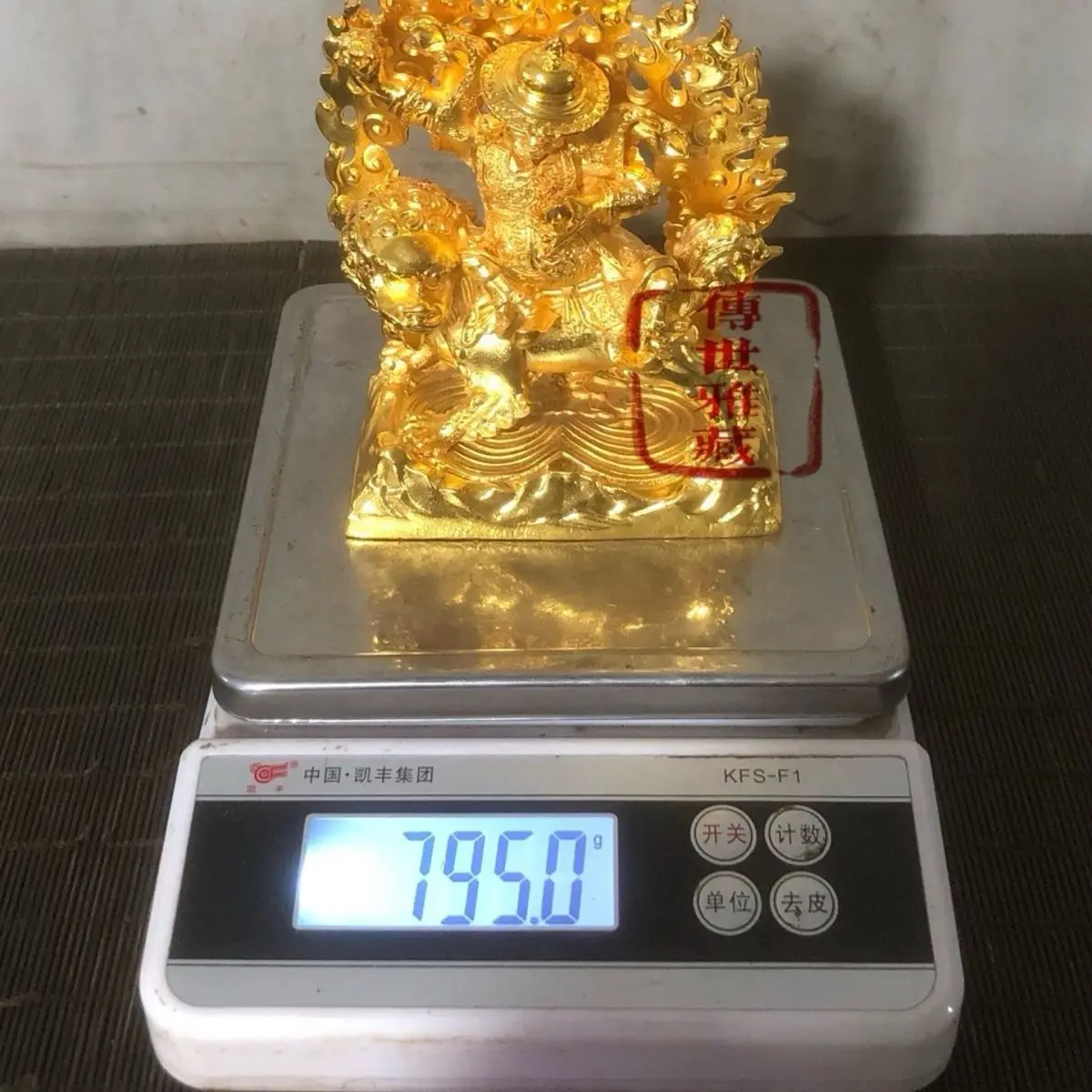Bronze gilded statue of riding a lion and guarding the law, enshrined in Tibetan Esoteric Buddhism