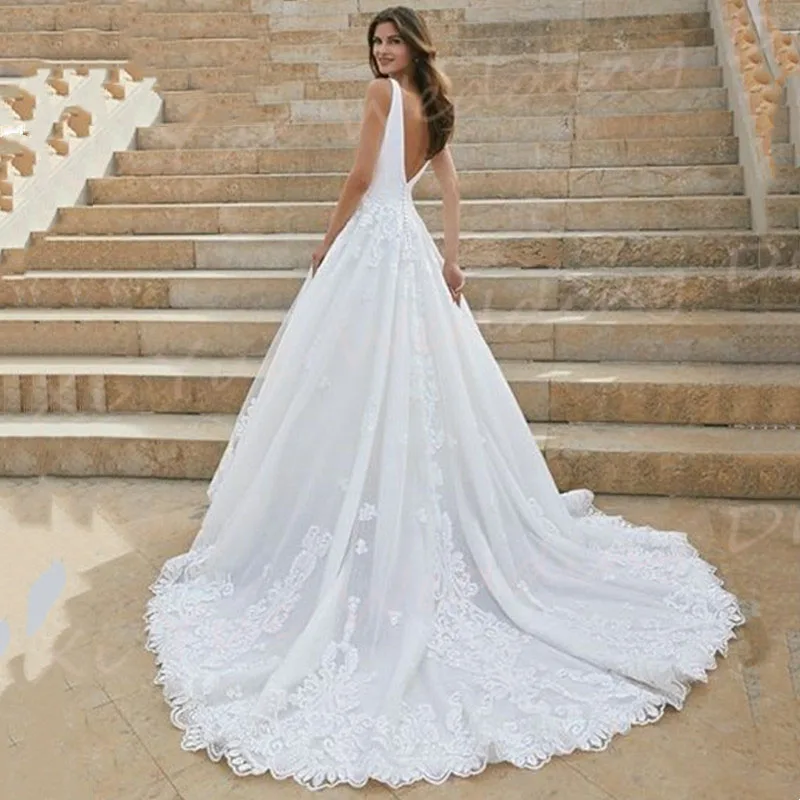 Vestidos De novia elegantes con escote en V profundo, vestidos De novia con apliques De encaje, sin mangas, Espalda descubierta, tul moderno