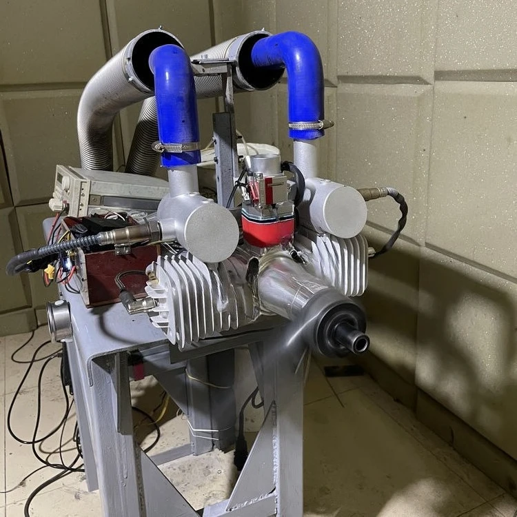 Two-stroke engine, fixed-wing, long-endurance power system, onboard generator