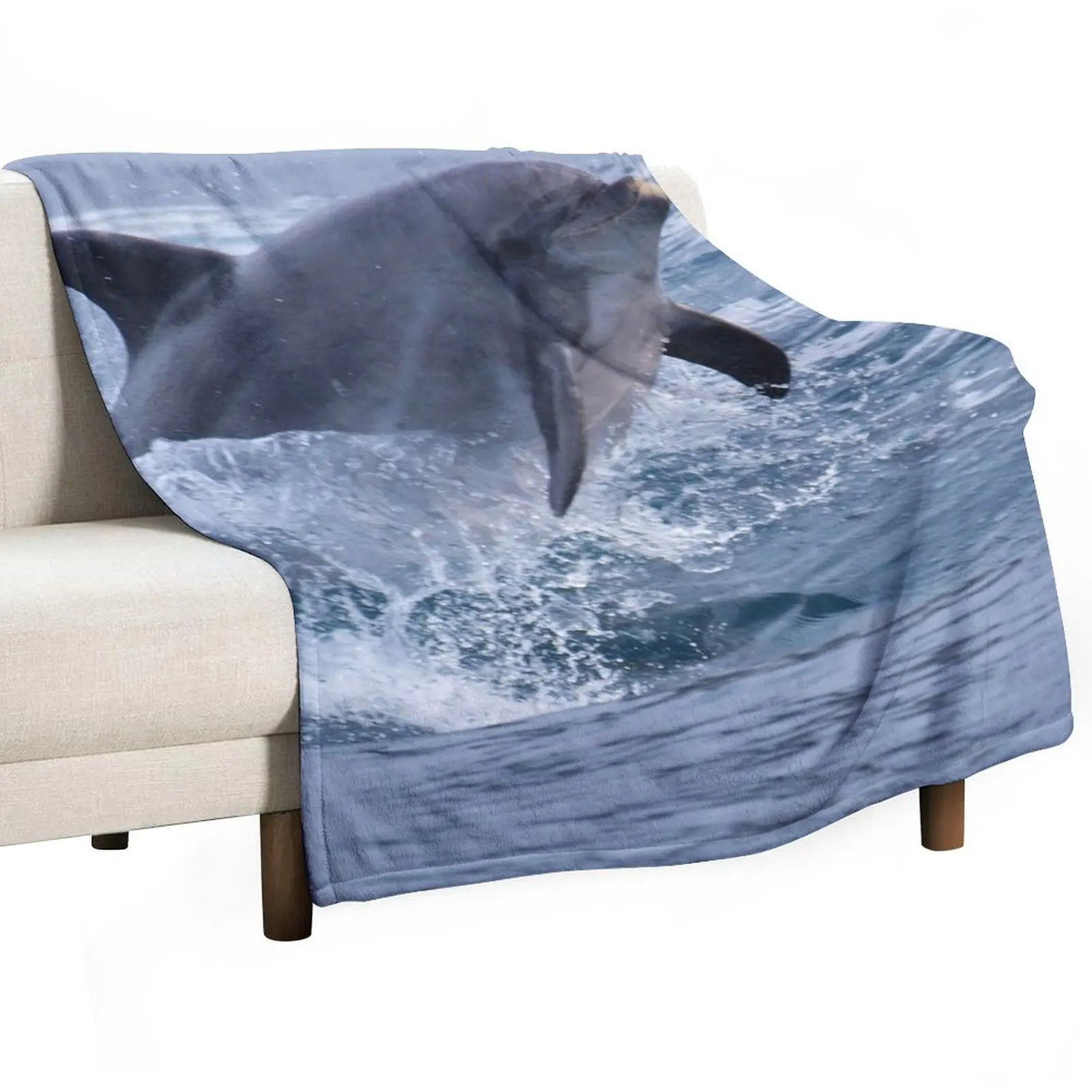 

Bottlenose dolphin (Tursiops truncatus) surfing the waves Throw Blanket Weighted Flannels Moving for sofa Blankets