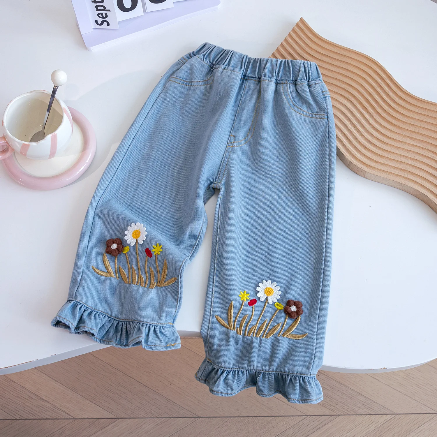Girls spring autumn cute hundred  foreign style jeans 2025  female treasure embroidery small flowers roll edge straight trousers