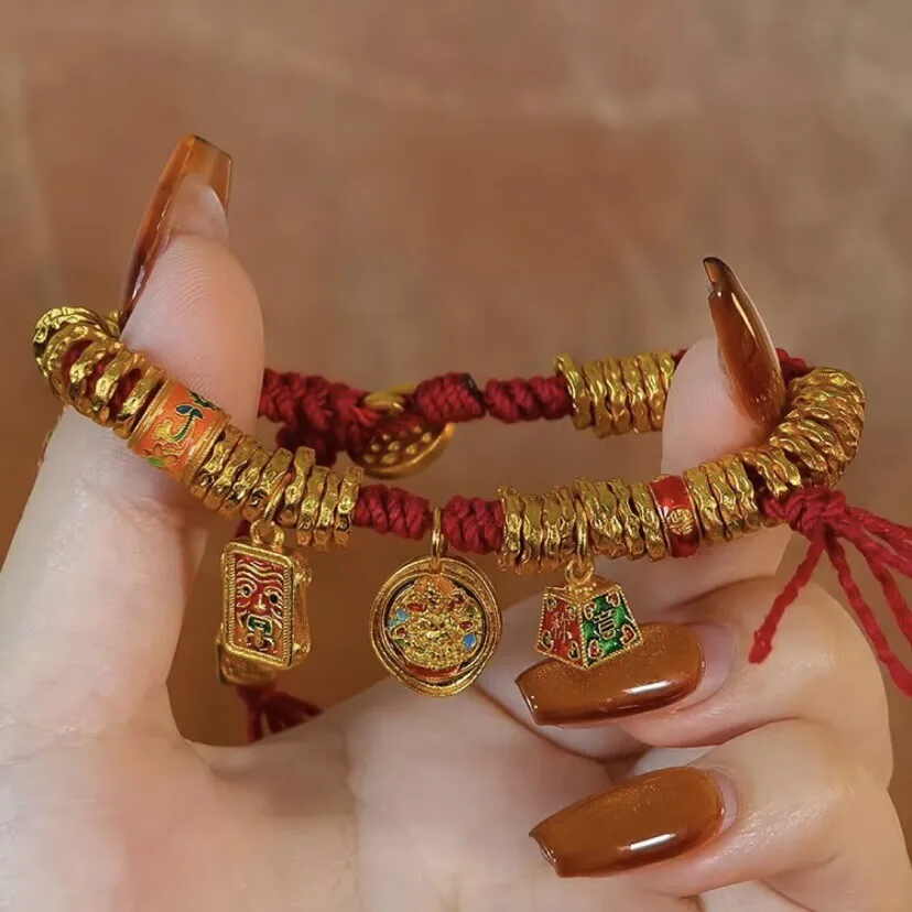 

Plated Real Gold Color Preservation Ancient Sand Gold Tibetan Style Zhakiram Wrapped In Red Rope Bracelet High End Girls Gift