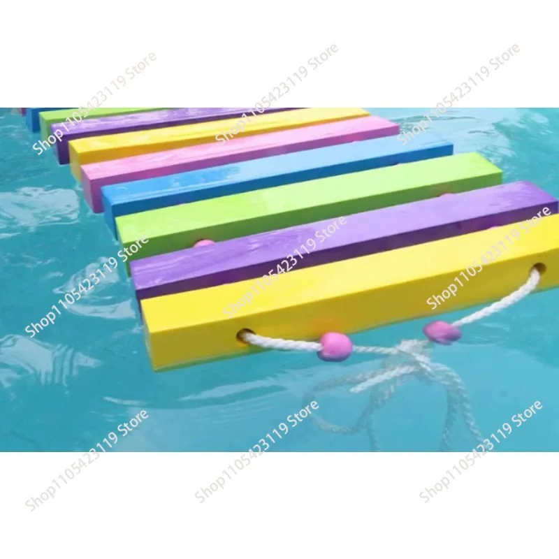 Colorful soft bridge pontoon bridge in aquatic Rainbow Bridge Swimming Pool