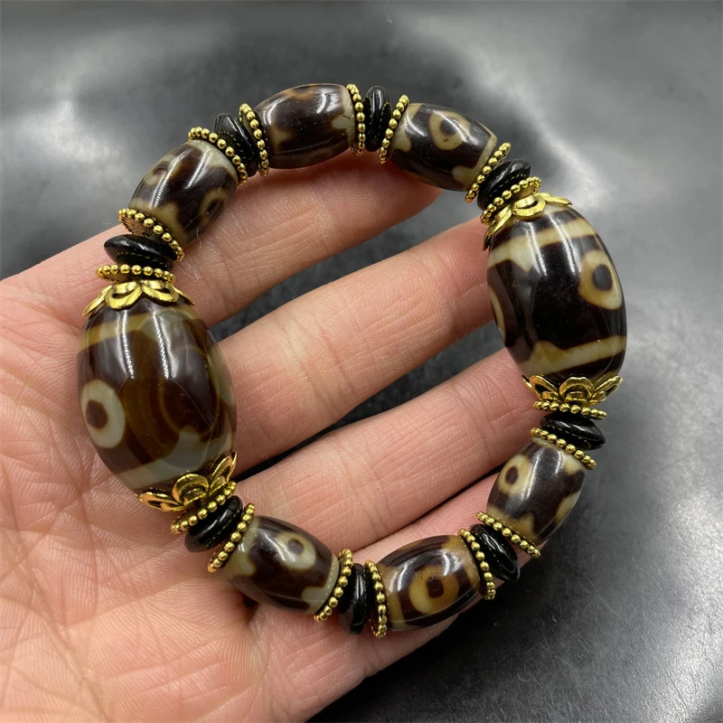 

Tibetan-style vintage three-eye dzi agate , double-strand , tube bead bracelet