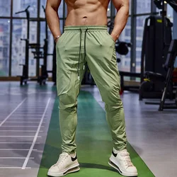 Pantaloni a matita pantaloni sportivi Casual da palestra da uomo pantaloni da pesca traspiranti ad asciugatura rapida in seta di ghiaccio sport all'aria aperta ciclismo Jogging Training