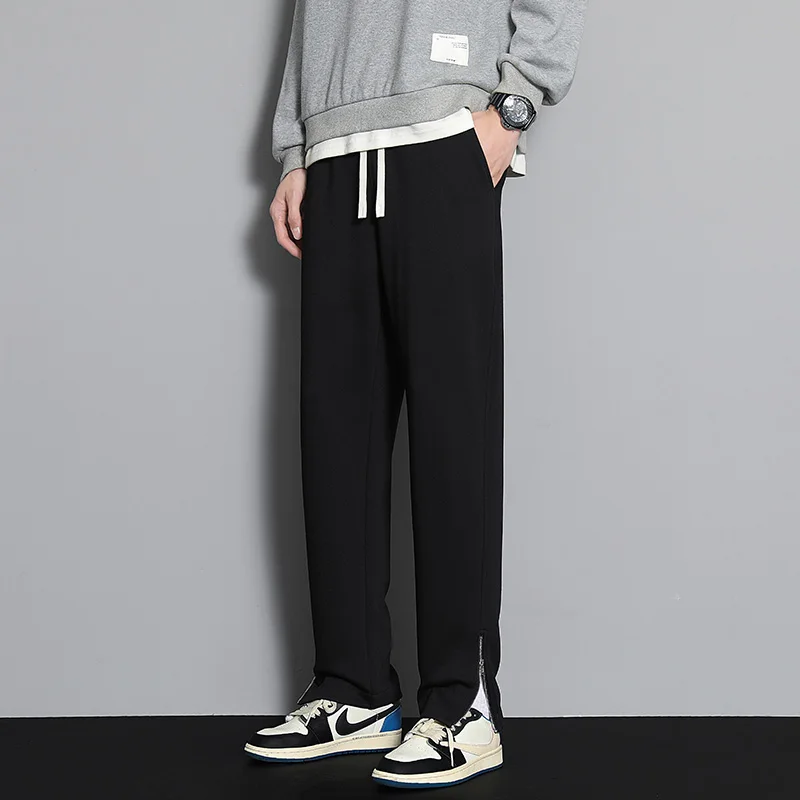 ملابس رياضية برباط بخصر مطاطي للرجال ربيع الخريف بنطلون رياضي متين بنطال واسع الساق مستقيم للرجال بناطيل عصرية فضفاضة غير رسمية