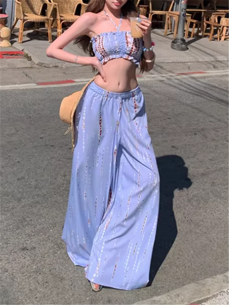 

Новинка 2026: Летний комплект в островном стиле для отпуска – топ без бретелек с принтом и брюки с высокой талией и широкими штанинами