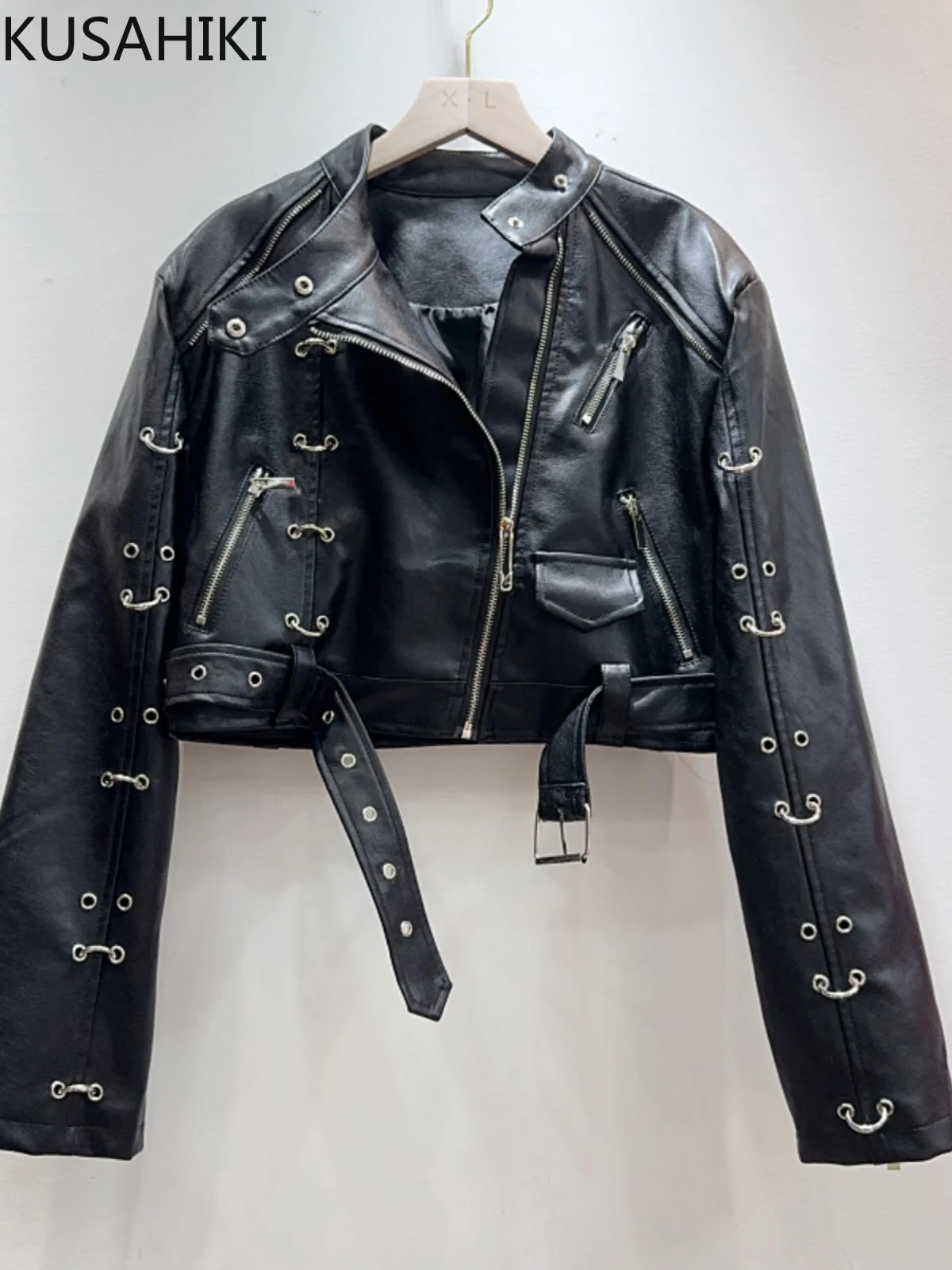 KUSAHIKI Women's Spring Autumn New PU Coat Spicy Girl Niche Design Motorcycle Style Metal Ring Rivets Short Leather Jacket