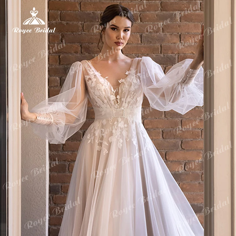 Boho-line suknie ślubne dla kobiet księżniczka V-neck bufiaste rękawy guzik płaski koronkowe aplikacje suknie panny młodej Sweep robe de mariée