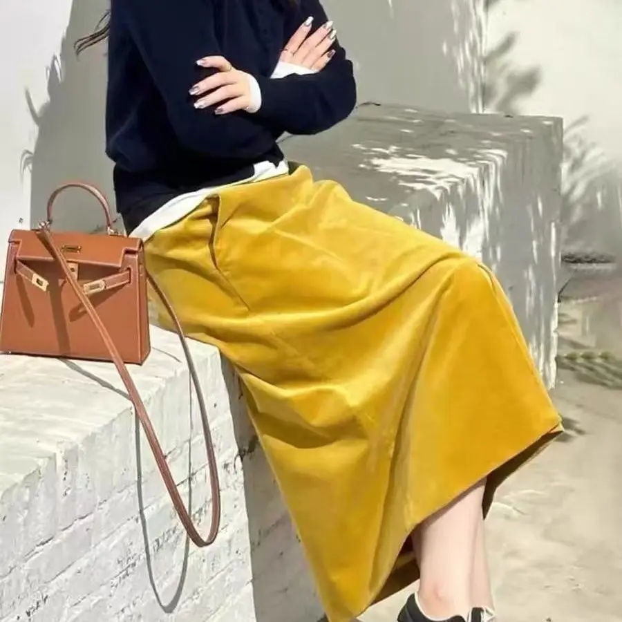 

Yellow corduroy skirt is popular in autumn and winter, autumn new elastic waist high waist fashion split fork and thin dress