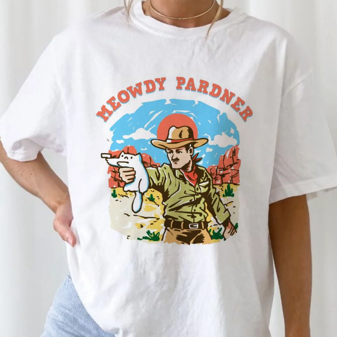 Camiseta informal holgada de manga corta con estampado de dibujos animados, Top básico con cuello redondo, ropa de moda con patrón de vaquero y gato