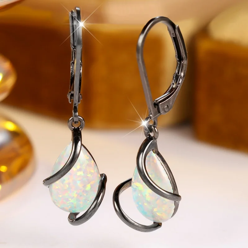 2026 New Dark Wind Wrapped Water Drop Opal Ear Buckle Female Niche Personality Gun Black Illusion Opal Accessories