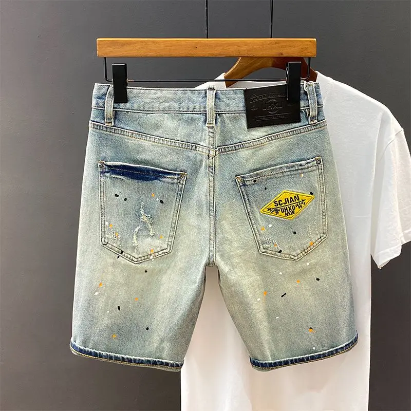 

Casual Loose Men's Denim Shorts Fashionable Design High Street Style Distressed Straight Leg Patchwork Five-Quarter Length
