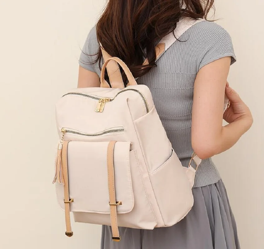 Hot Sale Fashion Tassel Waterproof Oxford Backpack Women Casual Large Capacity Shoulder Bags Laptop School Bag Travel Backpacks
