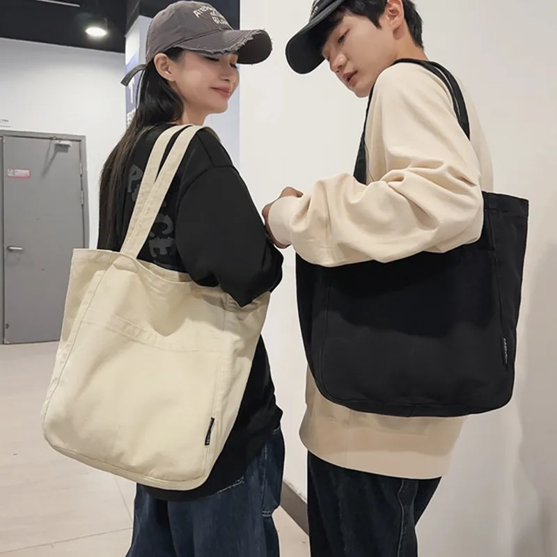 

2024 New Canvas Casual Shoulder Bag with Niche Design for Commuting Tote Bags