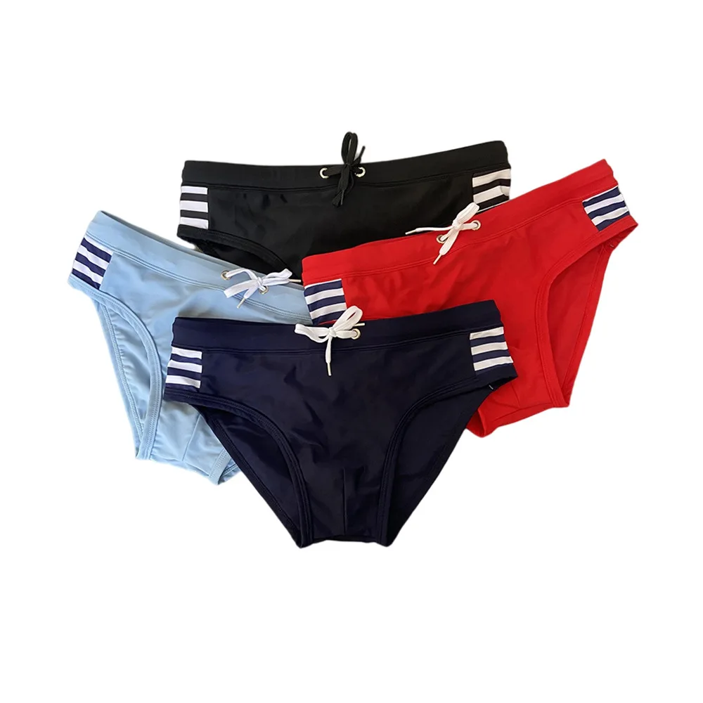 Solid color simple swimming trunks men's triangular low-rise sports swimming trunks surfing beach swimsuit tide 10042