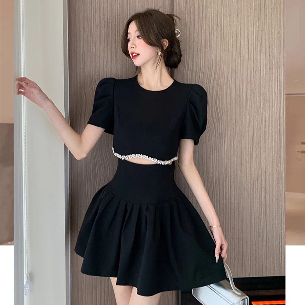 Minivestido sin mangas con tachuelas de diamantes para mujer, novedad de verano, aspecto fino, alto, manga corta, industria pesada, vestidos de estilo corto